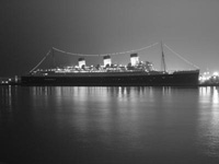 bw night photo of the Queen Mary